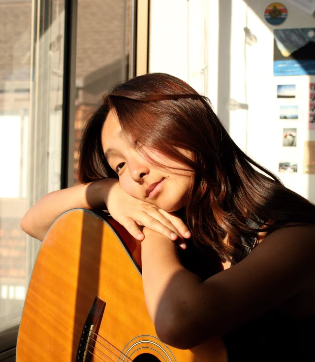 Jin-Hee Lee with guitar